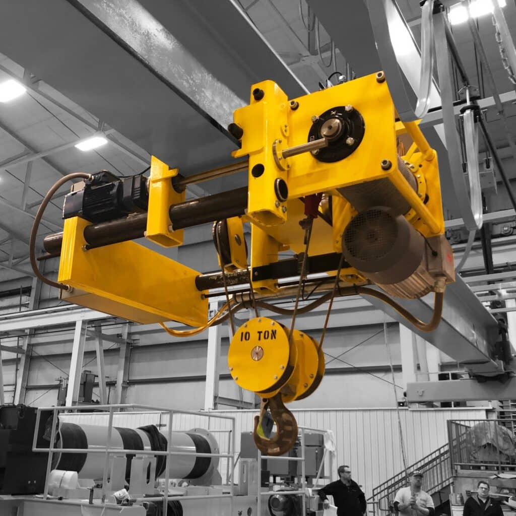 A large, yellow overhead crane