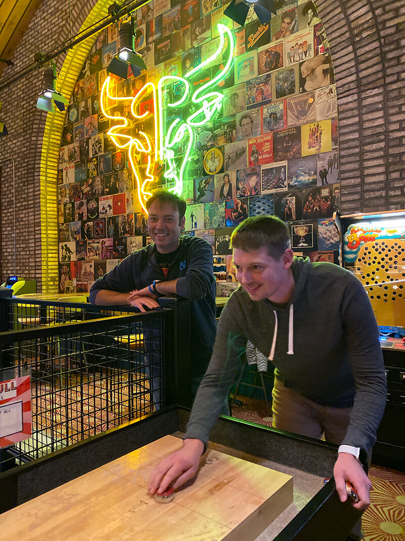 blues devrel team playing shuffleboard